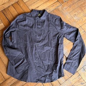 ATM size medium women’s button down. Boxier fit.